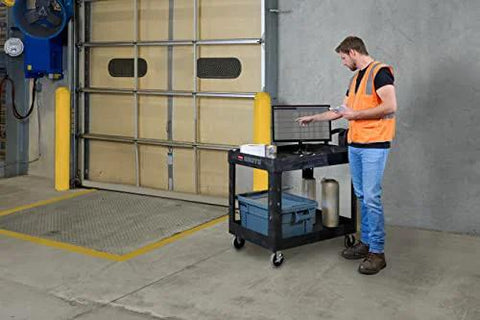 Two Shelf Foam Utility Cart With Lipped Shelves And Ergonomic Handle Black 500 Lb Capacity Durable Rolling Cart in warehouse