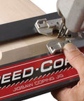 Speed Cope Crown Molding Jig With Adjustable Handle For DIY Woodworking in use with jigsaw making precise cope cuts.