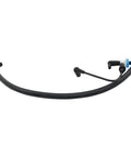 Automotive vacuum hose with check valve; curved black rubber hose with blue collar end connector