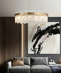 Sleek Gold Glass Pendant Light Adjustable Led Hanging Fixture With Cyan Crystal For Living Room Prime Pick Home Glow Up Solid Setup And Chic Everyday Vibes above a modern sofa and art.