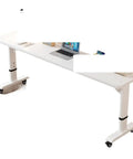 Built To Last Steel And Engineered Wood Adjustable Standing Desk With Smooth Hand Crank Height Adjustment and roll wheels in white.