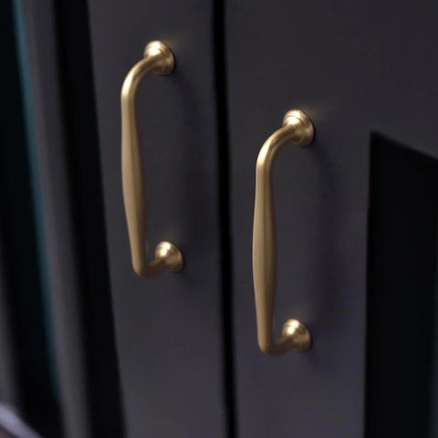 Installed Six Pack 5 Inch Center To Center Modern Champagne Bronze Cabinet Pulls on dark cabinet doors