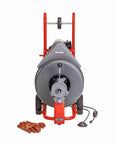 Heavy Hitter Auto Feed Drum Drain Snake Machine With 3 4 Inch C 100 Inner Core Cable, front view with gloves and wheels.