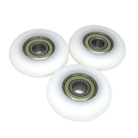 Four Piece Set Of Eight Millimeter Bore Forty Millimeter Outer Diameter Replacement Rowing Machine Seat Rollers Pom Coated Spherical Pulleys displayed.