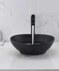 Oval Black Vessel Sink With Faucet And Drain Combo 16 By 13 Ceramic Bathroom Sink Above Counter Vessel Oval Porcelain Lavatory Vanity Art Basin Set Sleek Modern Design For Stylish Master Bath Or Powder Room