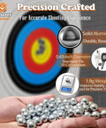 Hand holding 100Pcs .43 Caliber Hard Aluminum Balls, 1.83g Reusable Balls for Self Defense & Target Practice (100, Silver) with target in background