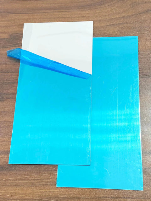 Two 430 Stainless Steel Magnetic Mounting Plates 12 x 6 Inches 0.5mm Thick with protective blue film, mirror finish.