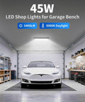 IP66 Waterproof 45W LED Shop Light With 5400 Lumens At 6000K Daylight White 6 Foot Power Cord And Built In Switch Plug In Work Light For Garage Workshop Warehouse Basement Or Yard Energy Saving Up To 80 Percent 2 Pack THECHAM illuminating a garage with parked car