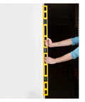 Durable 48 inch polystyrene level with 0.001 inch accuracy, built in the USA, featuring three vials, held against a wall.