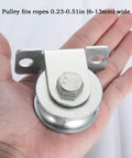 48mm Wheel Cable Pulley Wall Mount With Two Ball Bearings In Bearing Steel shown held in a hand, suitable for 0.23-0.51in ropes.