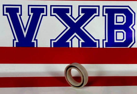 Acetal/POM Plastic Bearing 6700 with Glass Balls - 10x15x3mm, front view in front of VXB background.