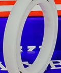Acetal/POM Plastic Bearing 6808 with Glass Balls, size 40x52x7mm, side view against blue background