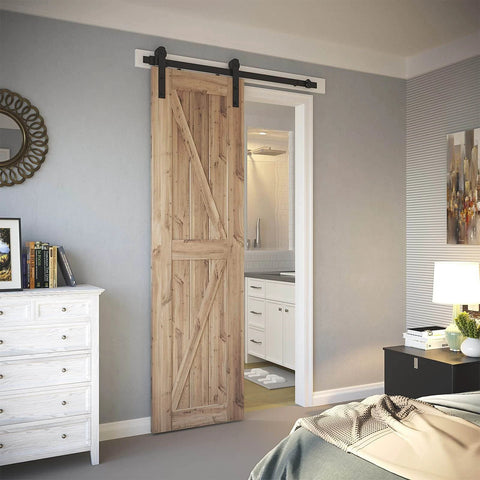 4ft Barn Door Hardware Kit with I shape hanger, heavy duty sliding door track installed in bedroom on wood door