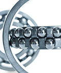 Close-up of 4mm Stainless Steel Bearing Balls G100 Precision, 304 Stainless, 50 Pack in a bearing, smooth surface, corrosion resistant