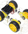 Assembled DIY 4WD Smart Robot Chassis Kit with Speed Encoder and Battery Box, showcasing four yellow wheels and transparent frame.