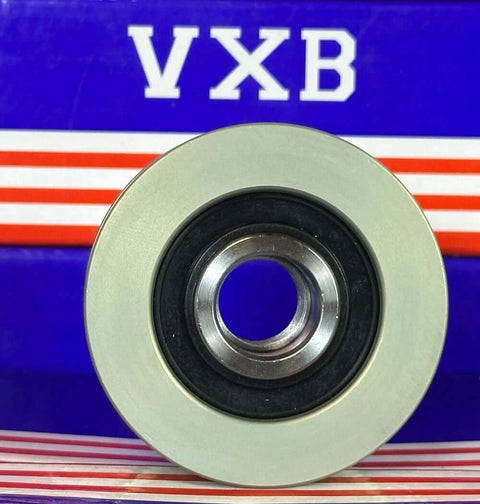 Close-up of silver pulley with black center on VXB packaging