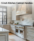 Modern kitchen with 30 Pack 5 Inch Champagne Bronze Cabinet Handles on light gray cabinets, featuring square gold pulls and zinc alloy construction.