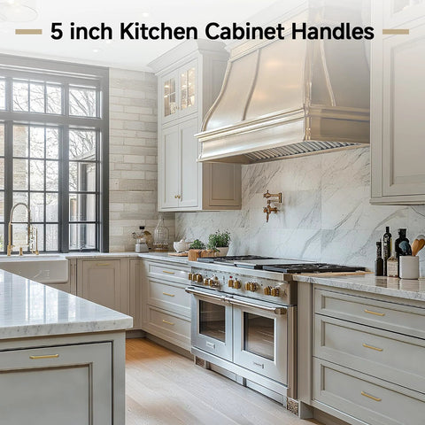 Modern kitchen with 30 Pack 5 Inch Champagne Bronze Cabinet Handles on light gray cabinets, featuring square gold pulls and zinc alloy construction.