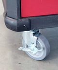 5 Inch Swivel Caster Wheels Set of 4 with Brakes, Heavy Duty Plate Casters, attached to a red cart corner, floor view