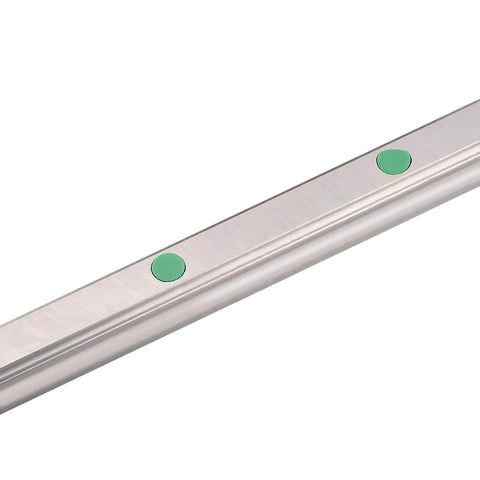 Close-up view of 500mm HGR20 linear guide rail segment showing the metal structure with green components for alignment, part of CNC precision tools.