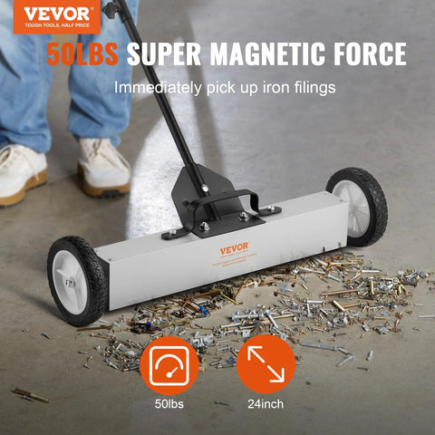 Effortless, heavy duty rolling magnetic sweeper with a 24 inch wide magnet and 50 lb pickup capacity shown picking up debris.