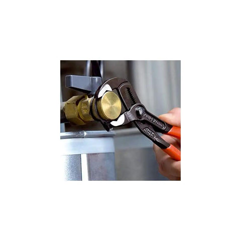 Using Cobra Water Pump Pliers With Seven And A Quarter Inch Length, V Jaw Style, Push Button Adjustment on pipe fitting.