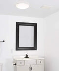 Bathroom Exhaust Fan 70 CFM Quiet 2.0 Sones, ceiling mounted above vanity in white bathroom for moisture and odor control.