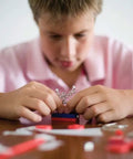 Child using Magnet Science Kit for Kids With 10 Hands On Magnetic Experiments And Games And 25 Plus Pieces To Build And Learn STEM