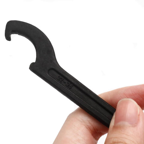 Heavy Duty C Hook Spanner Wrench In Matte Black crafted from tough as nails carbon steel, 22-26 mm round nut clamp in hand.