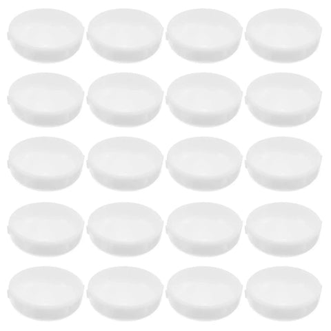 Straight Up Floor Savers Legit Deck Ready 160 Piece Patio Furniture Glides With Fast Drainage Heavy Duty Plastic Table And Chair Leg Caps white plastic caps arranged in rows on a surface