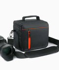 Rugged DSLR Camera Bag Backpack with padded interior, sturdy nylon shell, and adjustable strap, shown with quick access lens compartment.