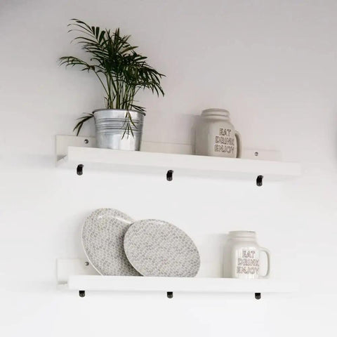Heavy Duty 24 Pack Black Corner Braces supporting white shelves with plates and a potted plant, ideal for DIY projects.