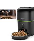 Zero Stress Fur Baby Snack Routine With This Smart Automatic Cat Feeder Boasting 1080P HD Camera And Infrared Night Vision Using 5G WiFi Plus Two Way Audio And Tight Portion Control To Keep Dry Kibble Fresh, black feeder dispensing kibble.