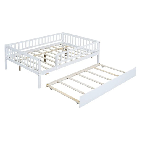 Full-Size Wood Daybed With Trundle And Fence Guardrails In White Finish showing trundle and sturdy frame