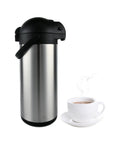 Stainless Steel Thermal Carafe Airpot Large Beverage Dispenser with Triple Wall Vacuum Insulation Keeps Coffee Tea Water Hot for Hours 5 L 170 Oz Easy Pump Top Portable for Picnics, Parties, and Office next to steaming cup of coffee.
