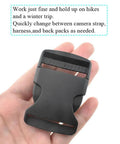Hand holding 1.5 Inch Quick Side Release Buckles 4 Pack No Fuss Durable Plastic Clips For Nylon Webbing Straps Great For Backpacks Dog Collars Belts And Gear Easy Quick Release Withstand Constant Motion Secure Hold.