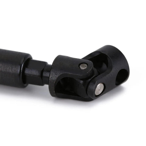 Close-up of Heavy Duty CNC Hardened Steel Drive Shaft For Axial SCX24 Rock Crawler Jeep Bronco JL showing joint detail.