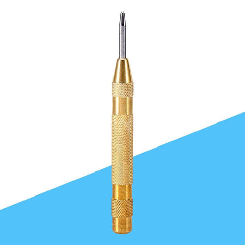 Automatic Center Punch Tool With HSS Tip Spring Loaded Brass Body No Hammer Needed For Precise Marking In Wood And Metal One Eighth Inch Roll Pin Punch Set Self Centering No Slip Durable Pro Grade Quality Ready To Roll shown upright against a blue and white background, highlighting the brass body and pointed tip.