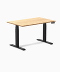 Top Tier Dual Motor Electric Height Adjustable Standing Desk With A Roomy 80 Inch Wide Bamboo Top And Sleek Matte Black Frame, side view.