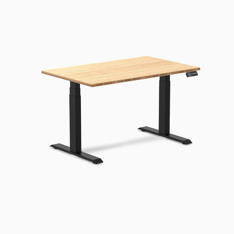 Top Tier Dual Motor Electric Height Adjustable Standing Desk With A Roomy 80 Inch Wide Bamboo Top And Sleek Matte Black Frame, side view.
