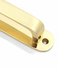 Close-up of Solid Brass Cabinet Pull With Backplate, 6.5 inch L-Shaped Handle in Polished Unlacquered Finish for kitchen