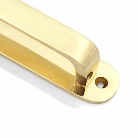 Close-up of Solid Brass Cabinet Pull With Backplate, 6.5 inch L-Shaped Handle in Polished Unlacquered Finish for kitchen