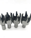 Upgrade Your Benchtop Game With This Slick Eight Piece Wood Plug Cutter And Dowel Maker Kit Featuring Straight And Tapered Drill Bits In Four Essential Metric Sizes, showing four steel wood plug cutters with sharp edges.