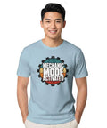 Cool Retro Mechanical Engineer T-Shirt For Real Gearheads And DIY Pros With Vintage Garage Typography Design Perfect For Shop Work Or Casual Days At The Office, worn by a young man, light blue color.