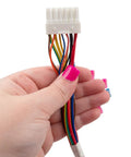 Hand holding connector from Go-To Ice Dispenser Auger Motor Replacement Kit For Refrigerator Models With Side By Side And French Door.