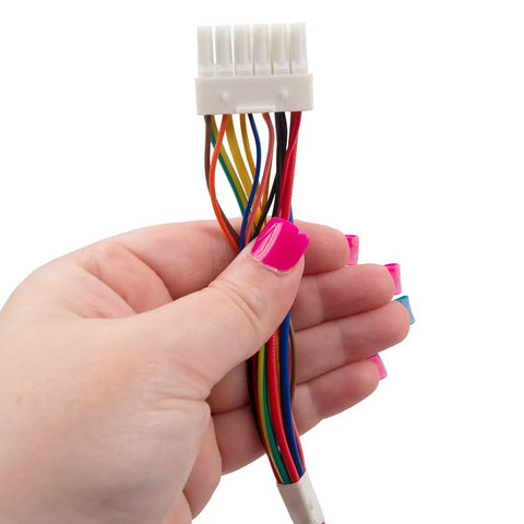Hand holding connector from Go-To Ice Dispenser Auger Motor Replacement Kit For Refrigerator Models With Side By Side And French Door.
