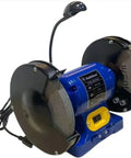 Top Shelf Eight Inch Bench Grinder With A Hella Reliable One Half Horsepower Motor Cranking At 3450 Rpm Featuring Fine And Coarse Polishing Wheels LED shop light showing the grinder.