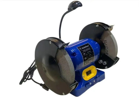 Top Shelf Eight Inch Bench Grinder With A Hella Reliable One Half Horsepower Motor Cranking At 3450 Rpm Featuring Fine And Coarse Polishing Wheels LED shop light showing the grinder.