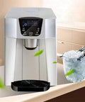 Top Shelf Portable Countertop Ice Maker With Sleek Stainless Steel Build Produces 33 Lbs Of Fire Ice In 7 Minutes displayed on kitchen counter with ice bucket.