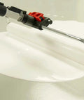 Sherlock Wideboy Hulk Adjustable Frame 18 Inch for Painting applying paint evenly on a flat surface with a white roller cover